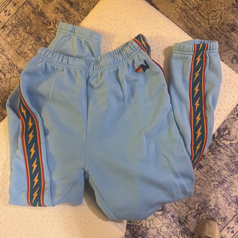 AVIATOR NATION Blue Track Pants with Lightning Bolt Design - fully sold out